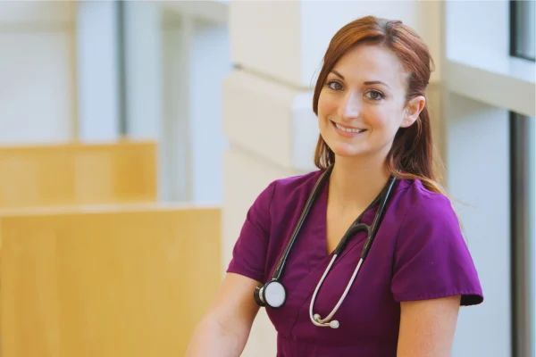 a woman wearing a stethoscope
