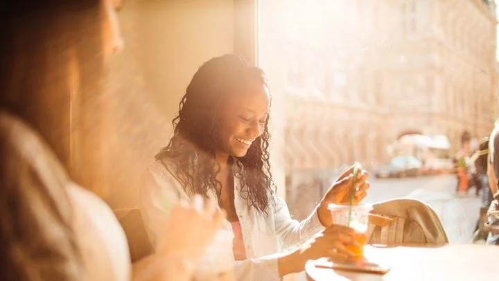 a woman wearing a feather boa
