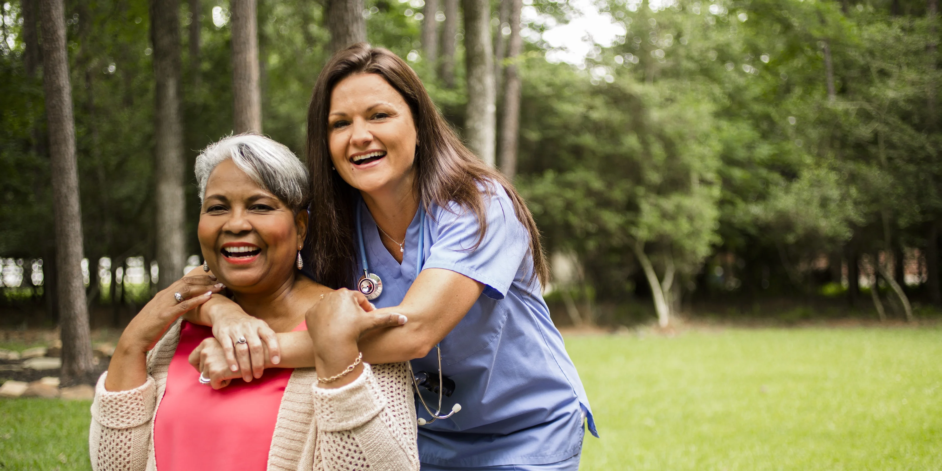 a nurse and a woman embracing